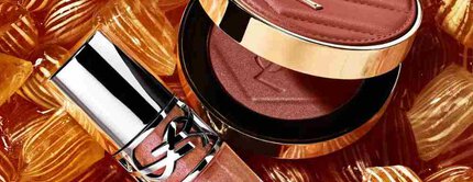 Blush luminoso e gloss YSL su caramelle ambrate