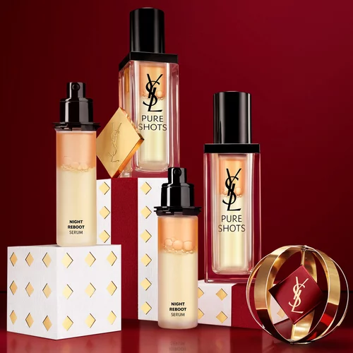 Flaconi del siero YSL Pure Shots Night Reboot e confezioni festive.