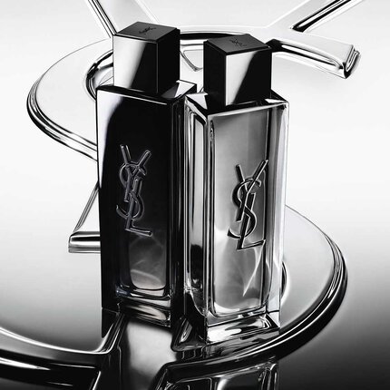 Due flaconi di profumo YSL neri e argentati
