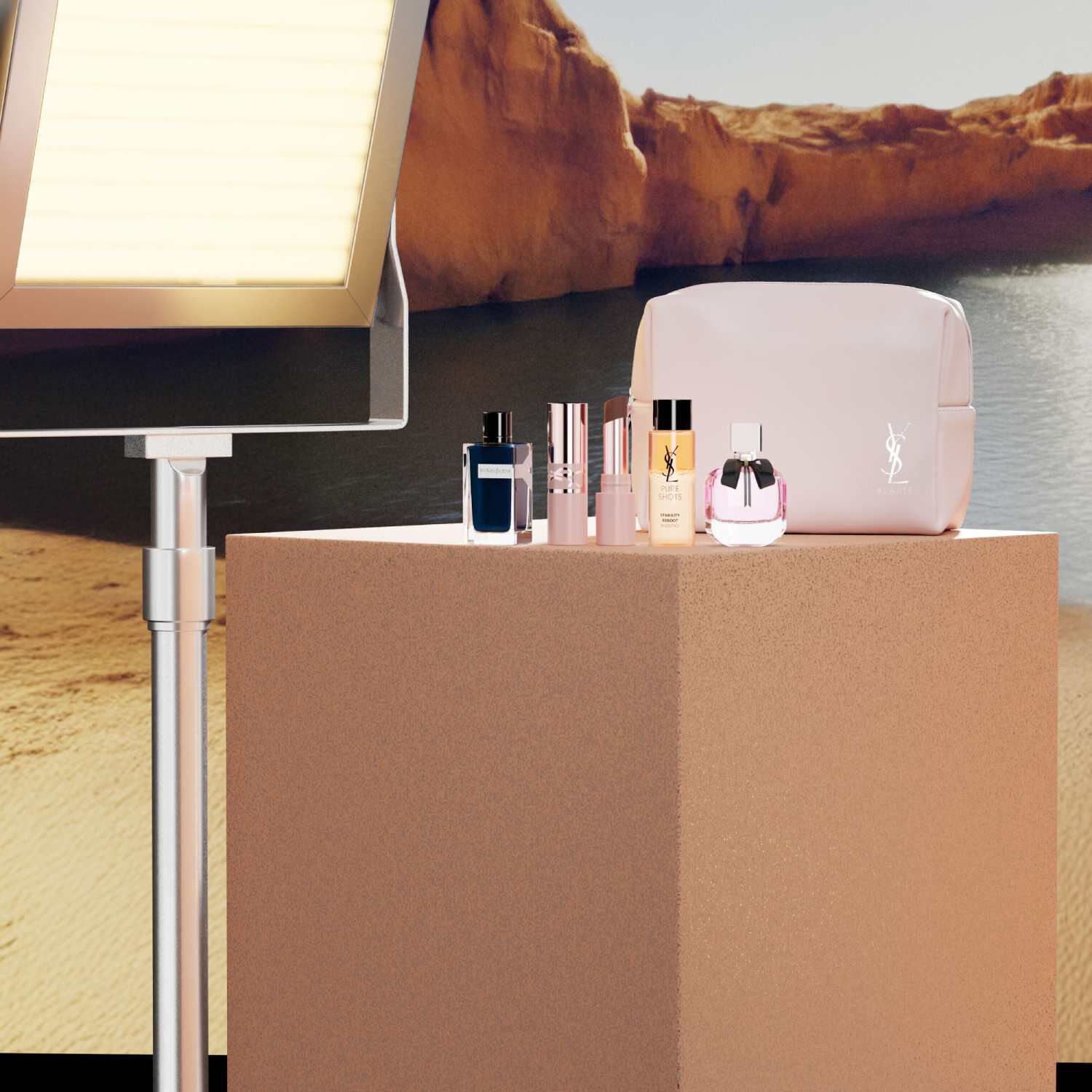 Set beauty YSL con mini prodotti e pochette.