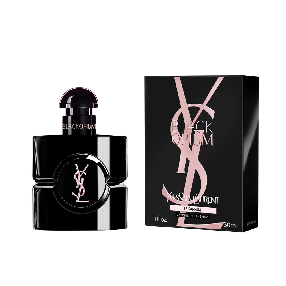 Flacone Black Opium Le Parfum accanto alla sua scatola nera, impreziosita dalla Cassandre YSL rosa.