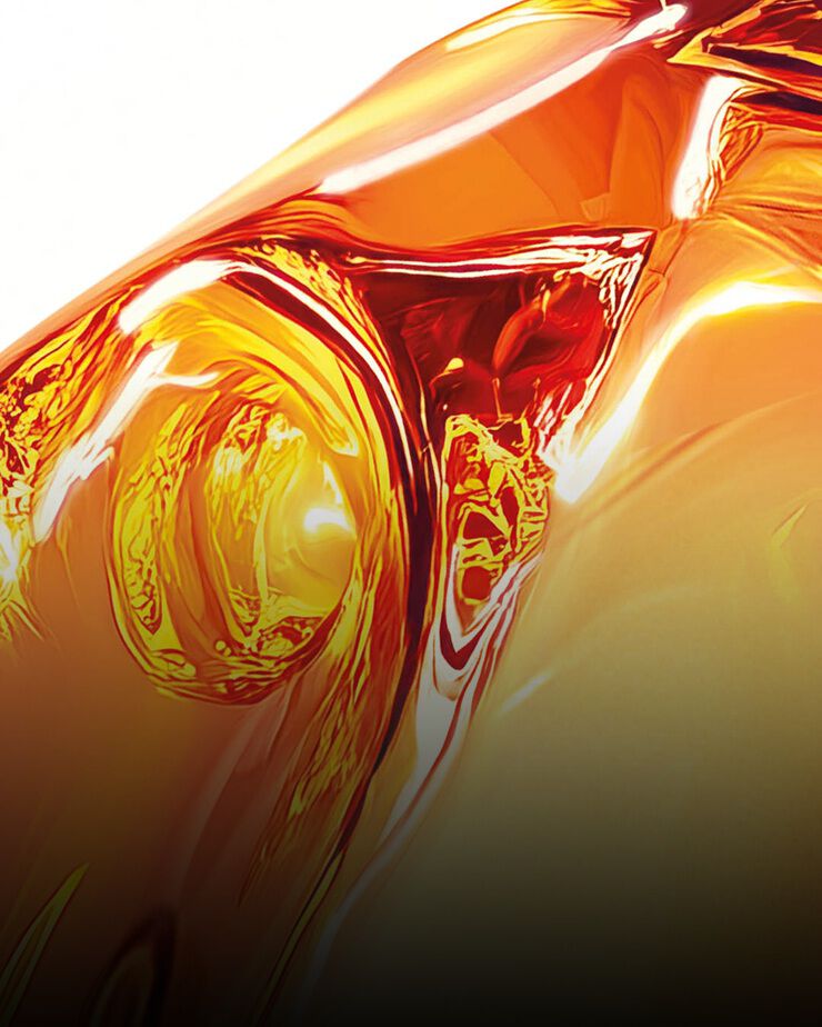 Texture liquida dorata e brillante che rappresenta l’ectoin