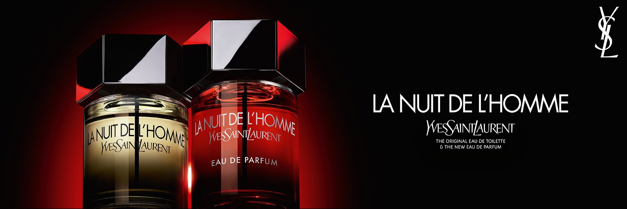 Uno scatto drammatico dei flaconi di La Nuit de l'Homme Eau de Toilette e Eau de Parfum fianco a fianco, che mette a confronto il classico liquido ambrato con il nuovo intenso sfumato rosso.