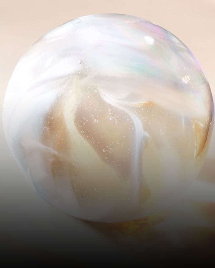 Sfera traslucida madreperlata che rappresenta il complesso Alpha-Panthenol